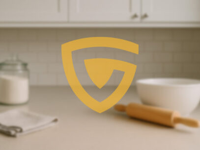 GAP logo on top of photo of kitchen counter with a towel, wooden rollong pin, white mixing bowl and a glass jar of sugar.